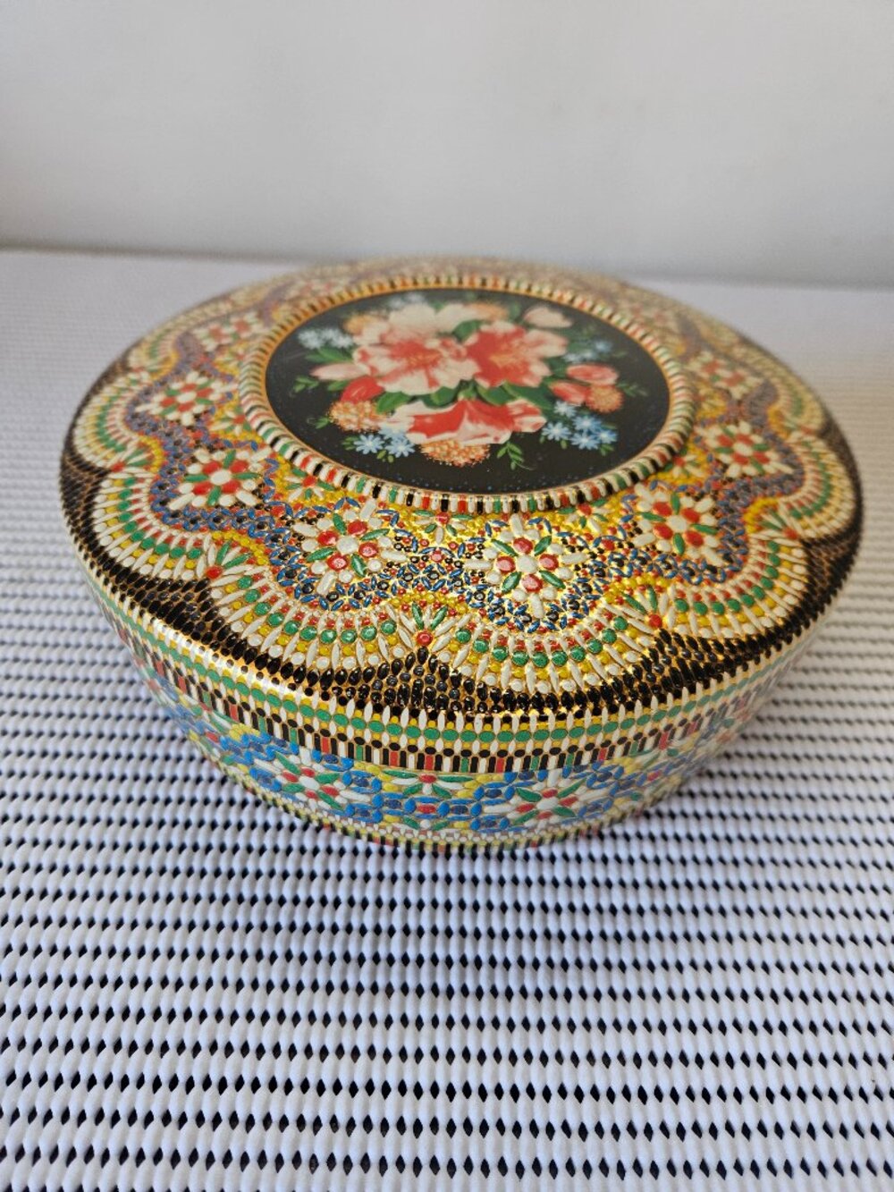 Vintage embossed mosaic-style floral tin